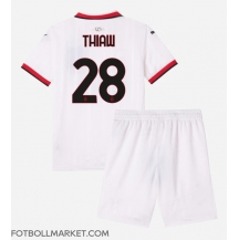 AC Milan Malick Thiaw #28 Replika Bortatröja Barn 2024-25 Kortärmad (+ byxor)