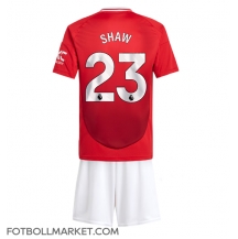 Manchester United Luke Shaw #23 Replika Hemmatröja Barn 2024-25 Kortärmad (+ byxor)